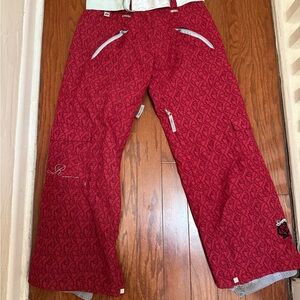 Ride snowboard pants cell series 5 red with barbed wire pattern women’s small